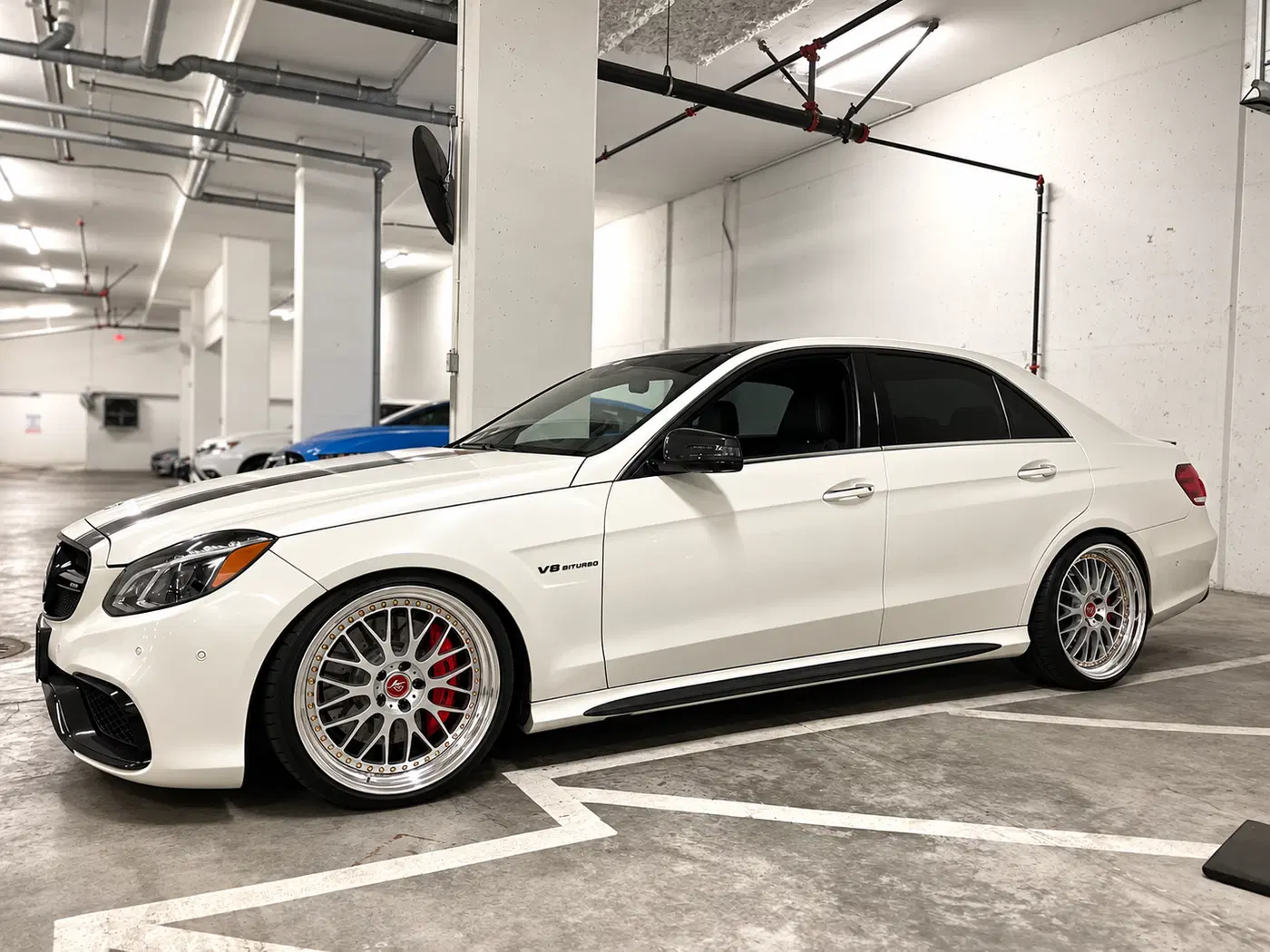 AI-generated view of a 2015 Mercedes-Benz E63 S AMG with Work Wheels VS-XX three-piece step-lip wheels