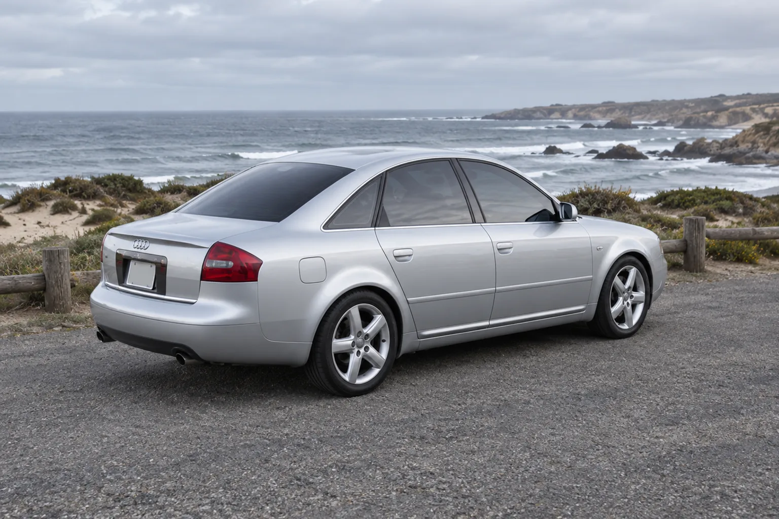 AI-generated view of a 2000 Audi A6 with Audi OEM B6 A4 wheels