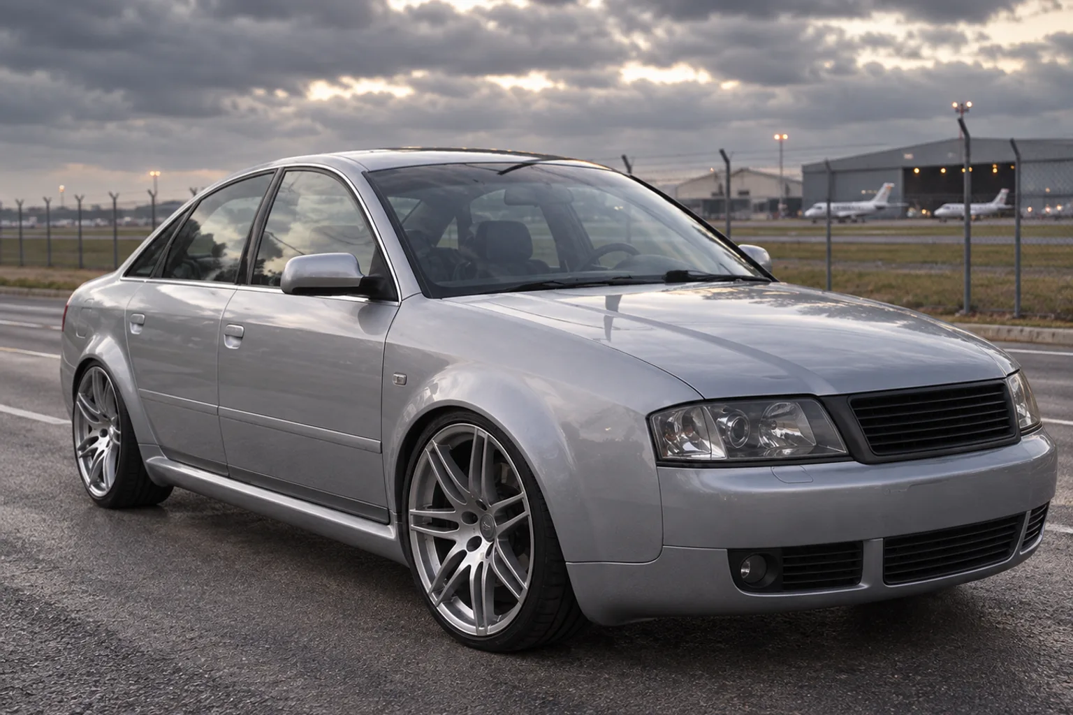 AI-generated view of a 2000 Audi A6 4.2 with Audi R8 V10 Replica wheels