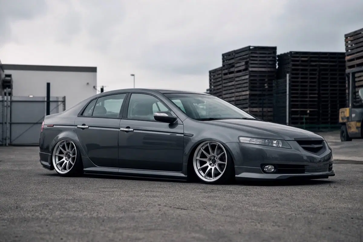 AI-generated view of a 2004 Acura TL with Fast Kosoku wheels