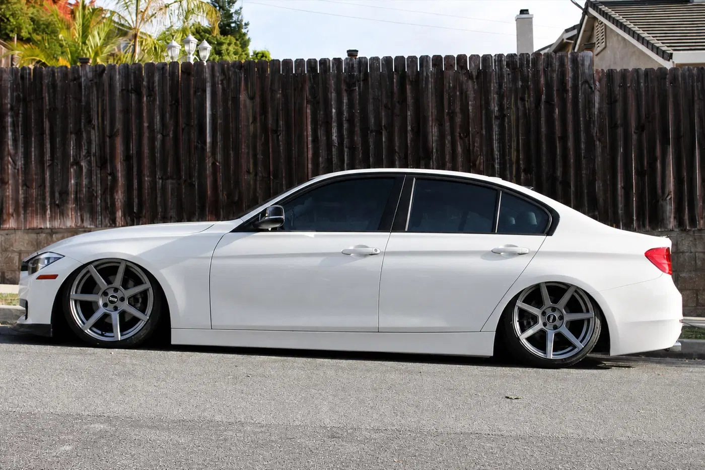 AI-generated view of a 2012 BMW 328i with VMR V706 wheels