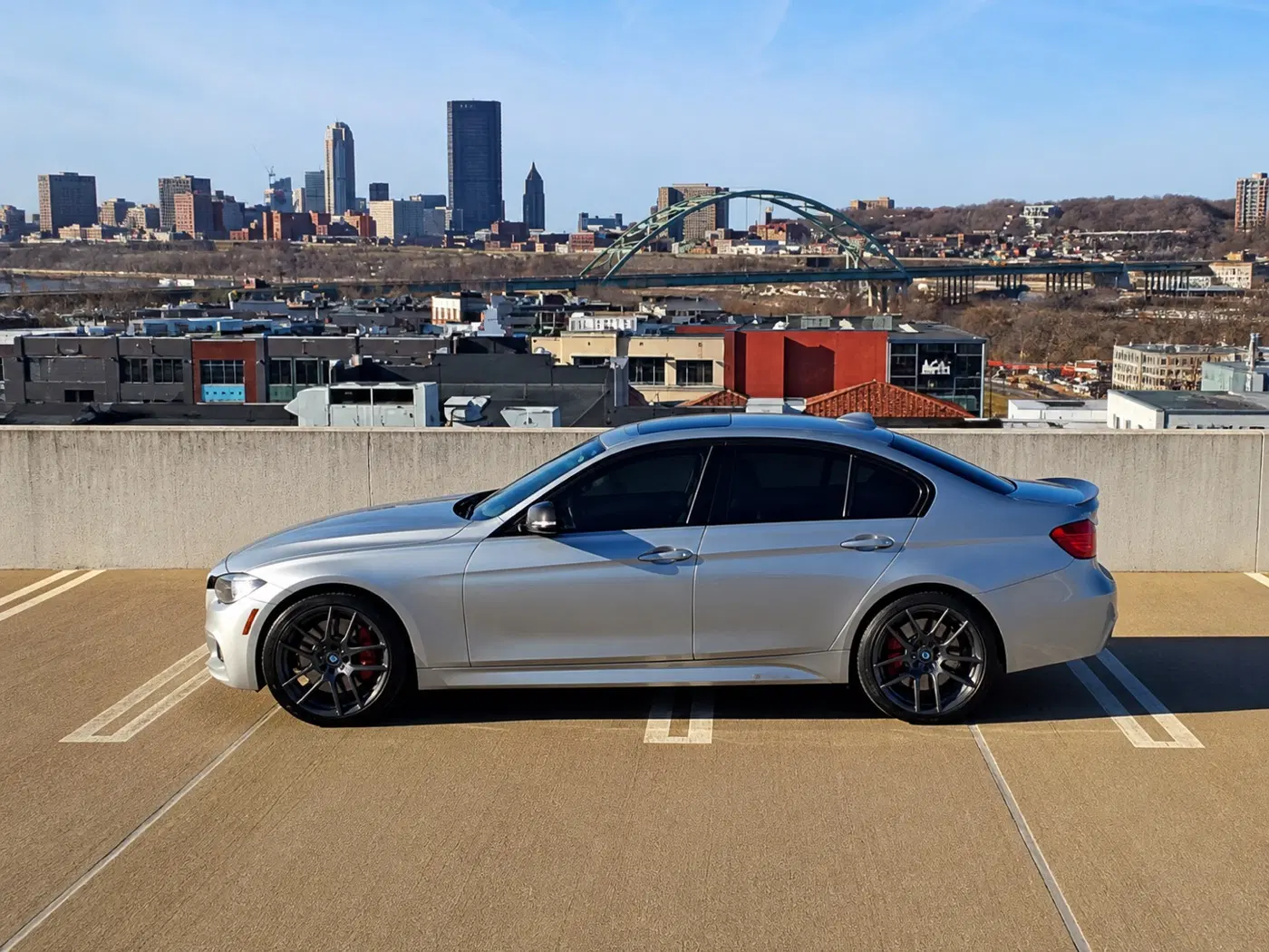 AI-generated view of a 2013 BMW 335i xDrive M Sport with Velgen VMB5 wheels