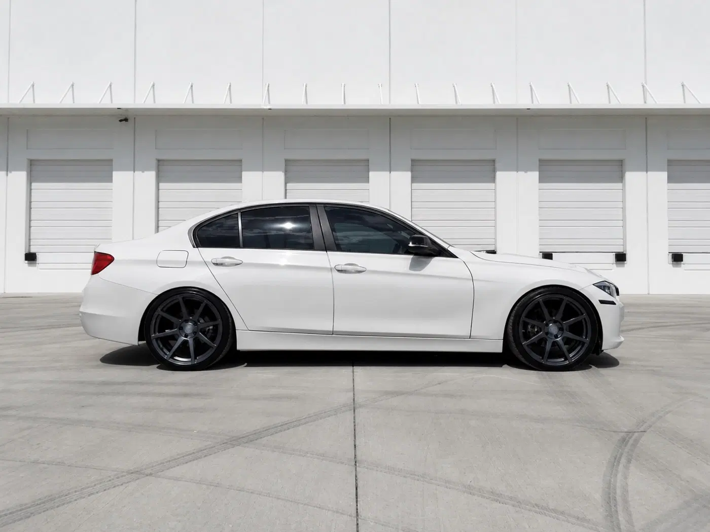 AI-generated view of a 2014 BMW 320i with Velgen VMB8 wheels
