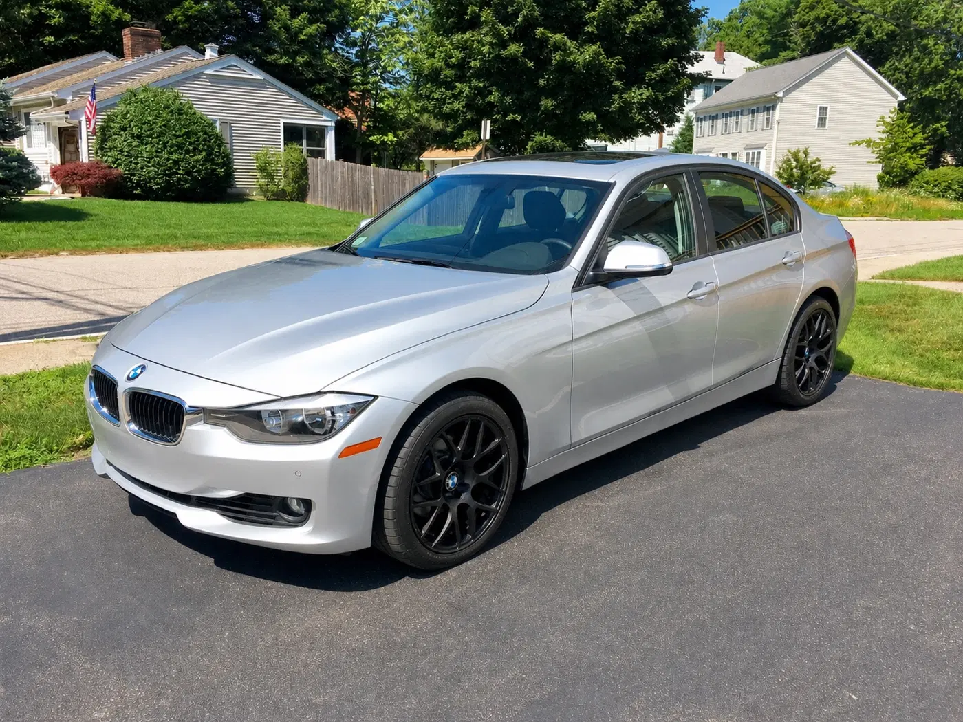 AI-generated view of a 2014 BMW 328i with VMR V710 wheels