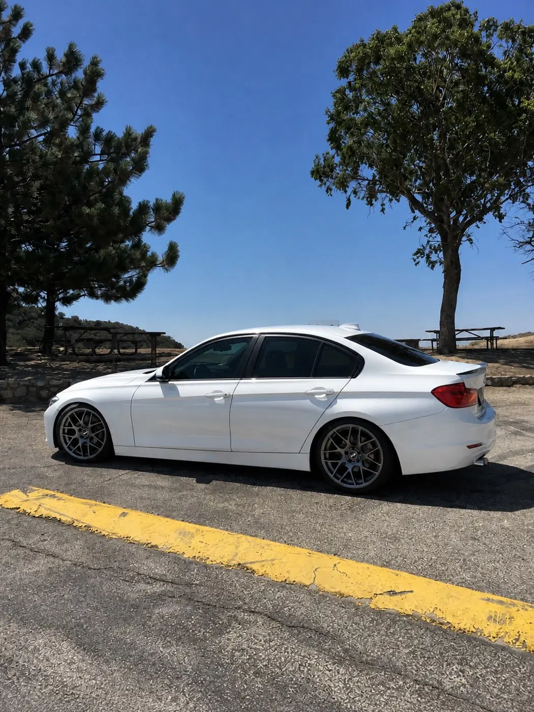 AI-generated view of a 2014 BMW 328i with VMR V710 wheels