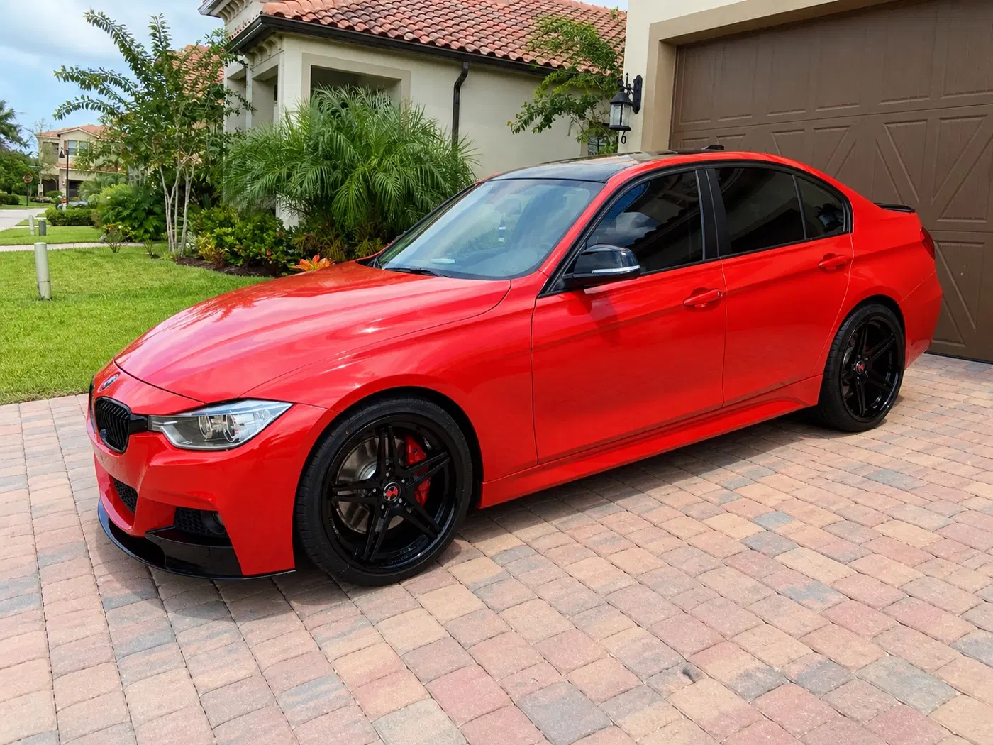 AI-generated view of a 2014 BMW 335i with Vertini Monaco wheels