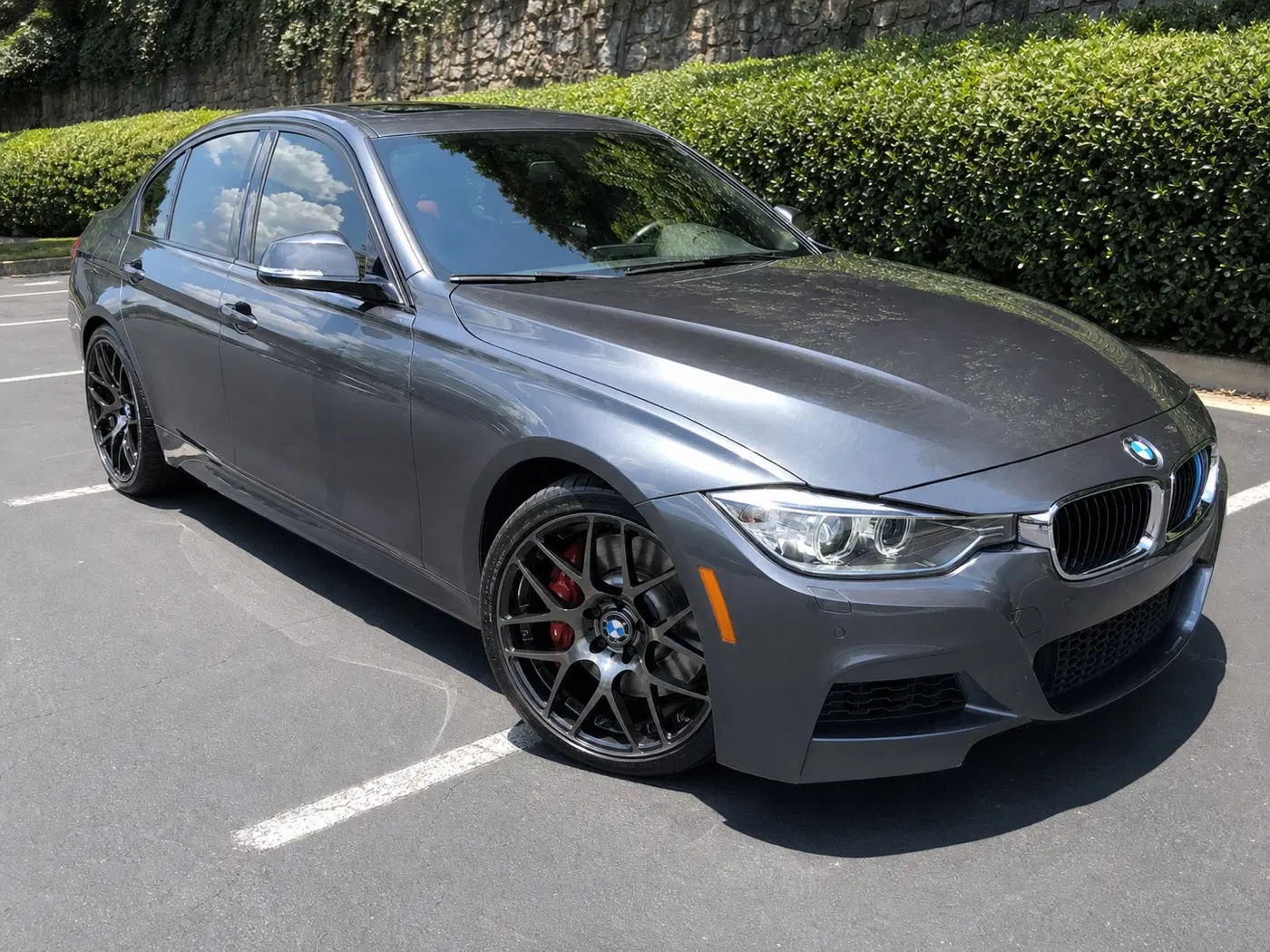 AI-generated view of a 2014 BMW 335i M Sport with VMR V710 wheels