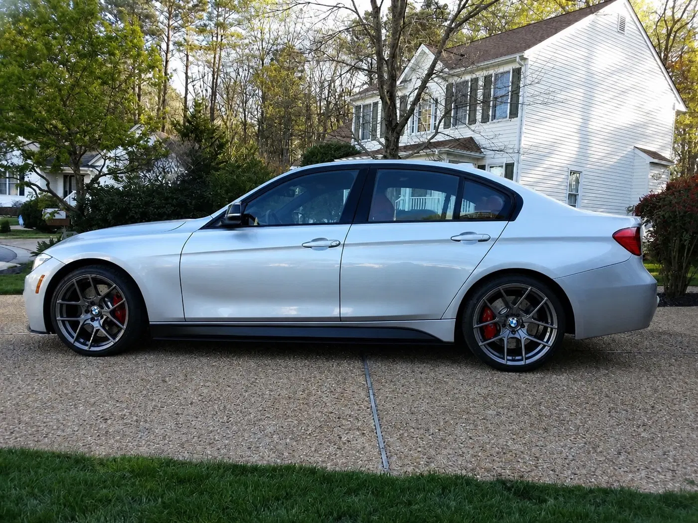 AI-generated view of a 2014 BMW 335i with VMR V803 wheels