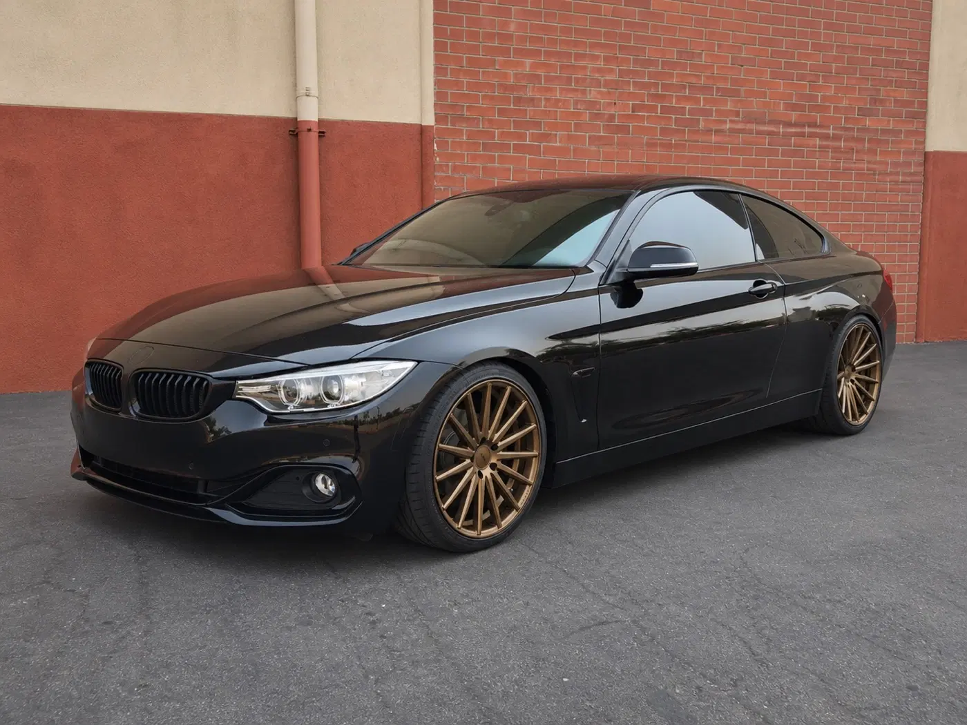 AI-generated view of a 2014 BMW 428i with Vossen VFS2 wheels