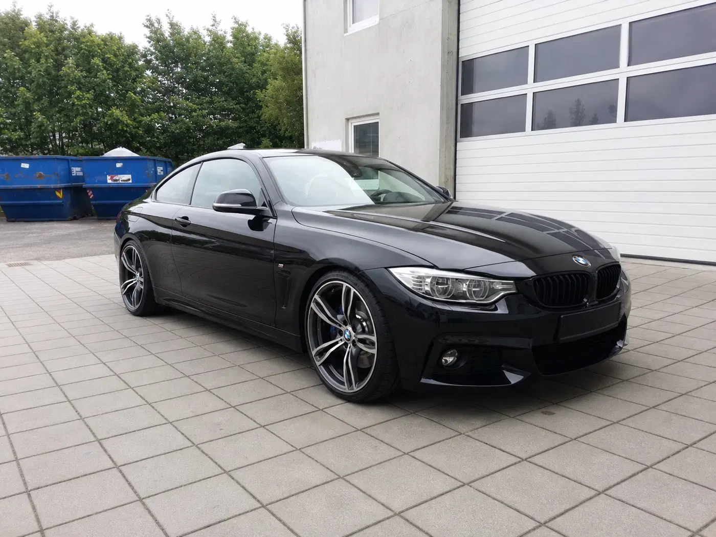 AI-generated view of a 2014 BMW 428i with WSP Daytona M5 Replica wheels