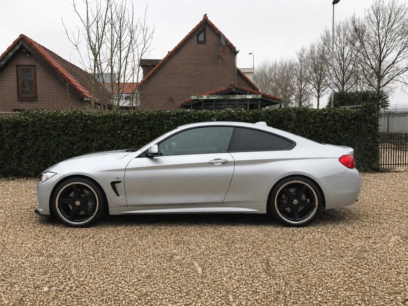 AI-generated view of a 2014 BMW 435i xDrive with Schmidt XS5 wheels