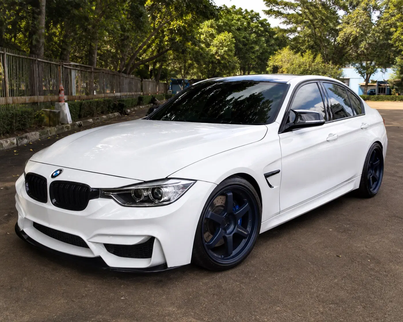 AI-generated view of a 2015 BMW 320d M Sport with Volk Racing TE37 Ultra wheels
