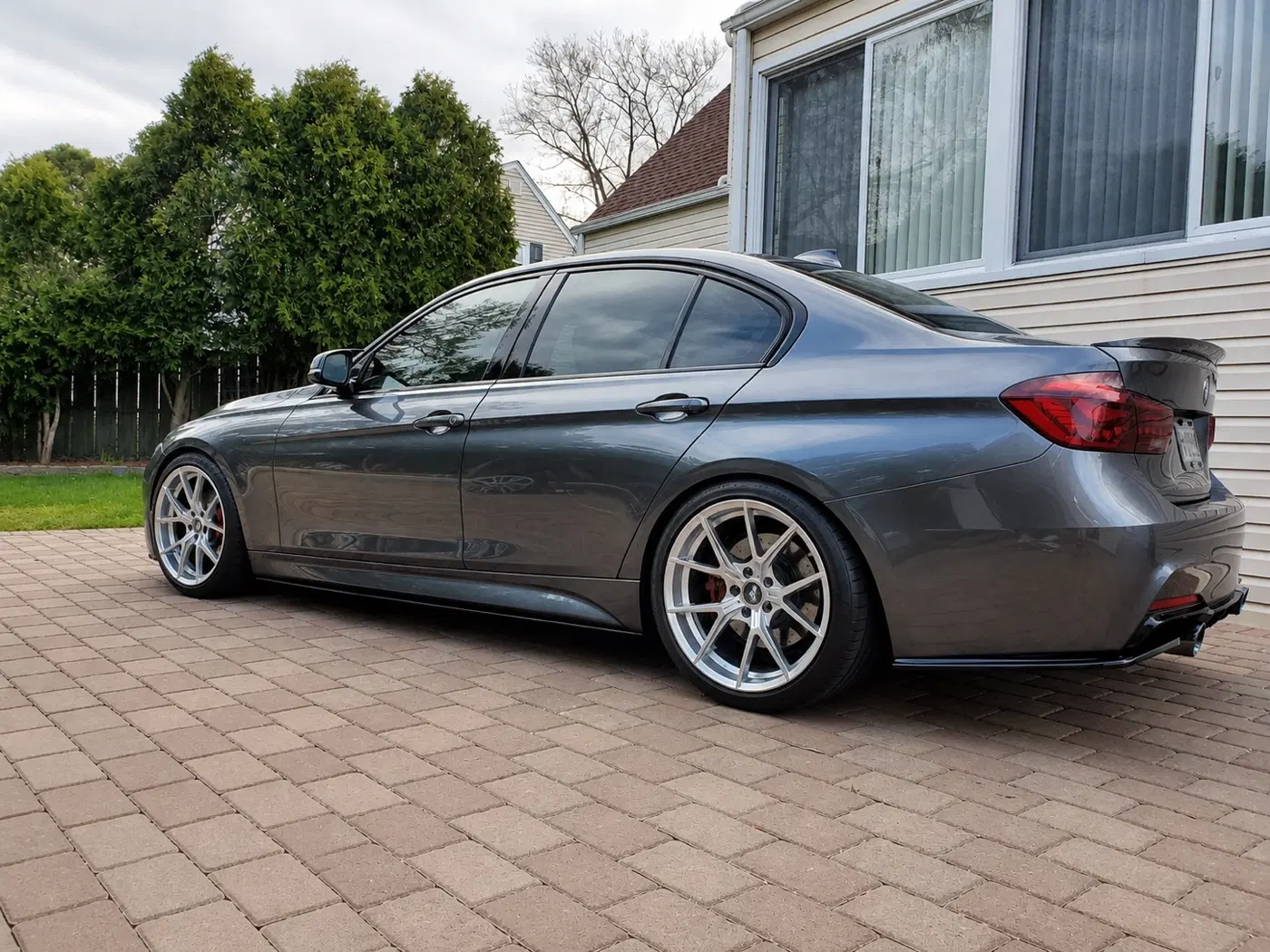 AI-generated view of a 2015 BMW 335i with VMR V804 wheels