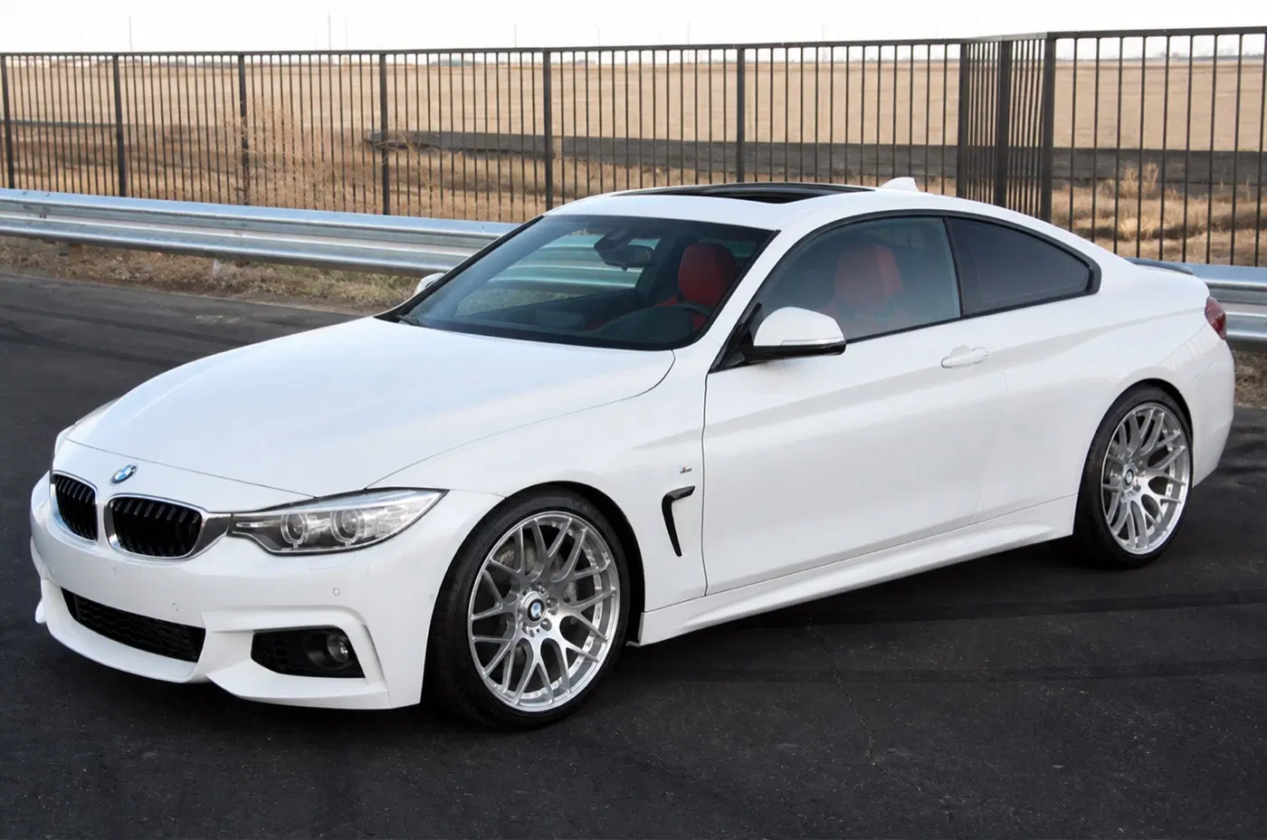 AI-generated view of a 2015 BMW 428i M Sport Coupe with VMR V710 wheels