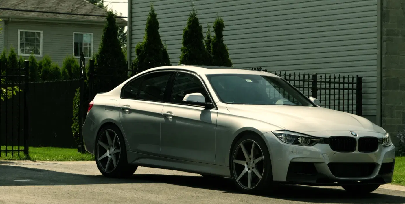AI-generated view of a 2017 BMW 340i xDrive with Vossen CV7 wheels