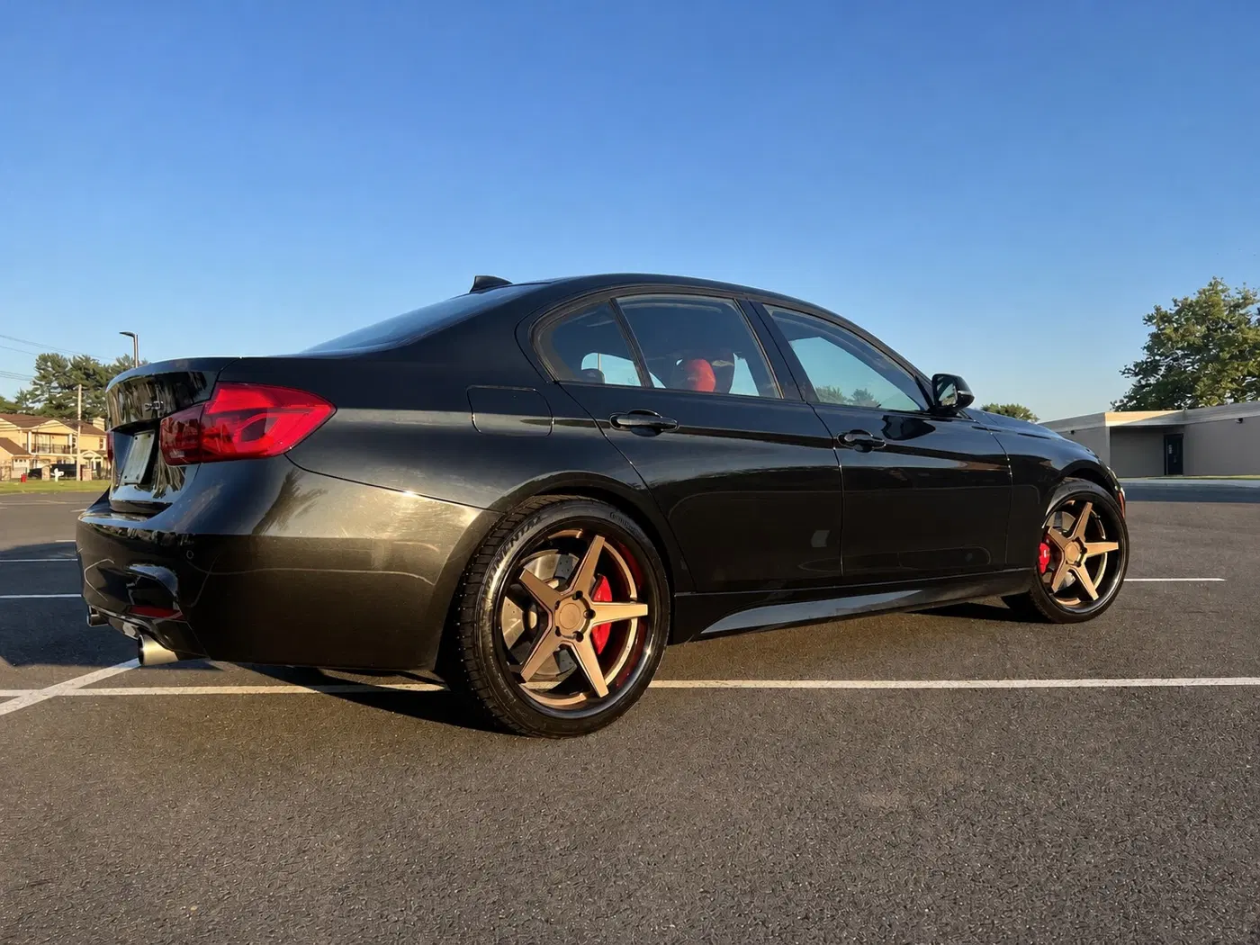 AI-generated view of a 2018 BMW 340i xDrive M Sport with Ferrada FR3 wheels