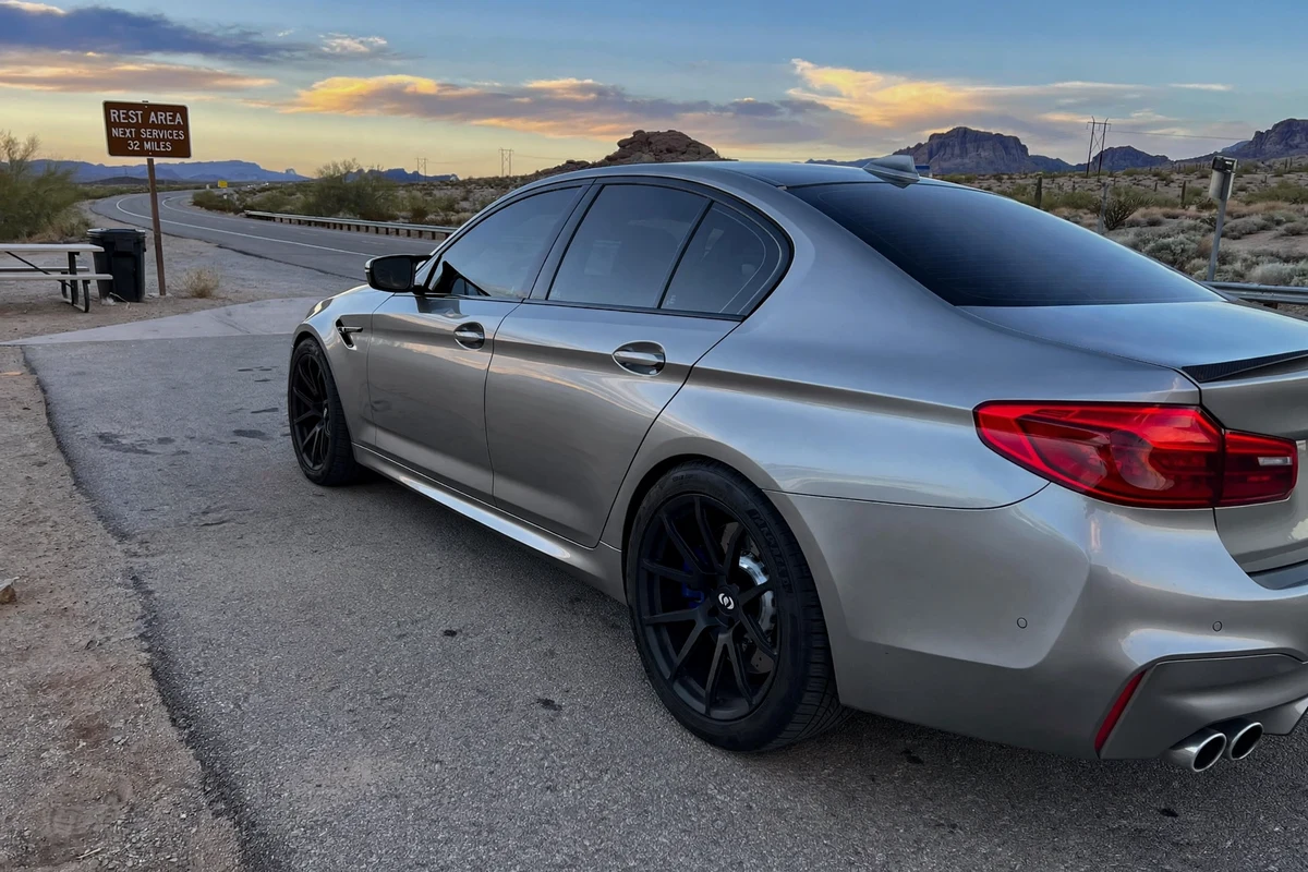 AI-generated view of a 2020 BMW M5 with Dinan DC3 wheels