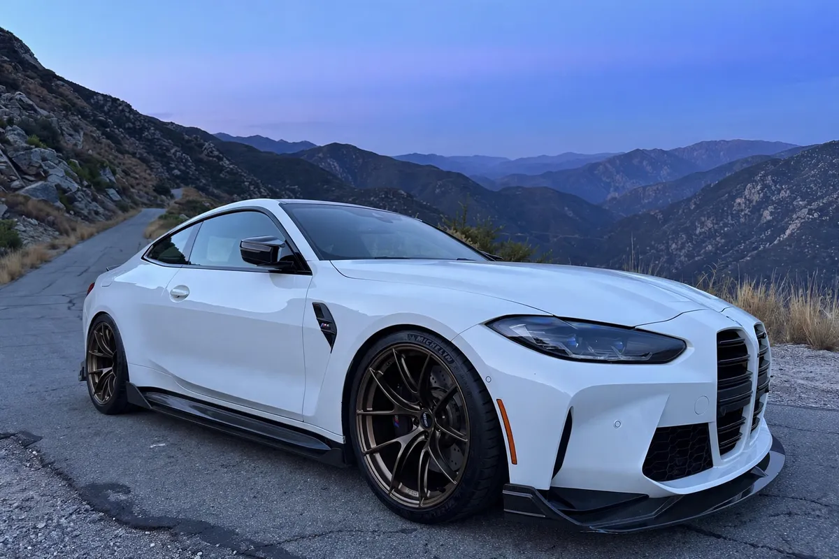 AI-generated view of a 2021 BMW M4 with APEX VS-5RS wheels
