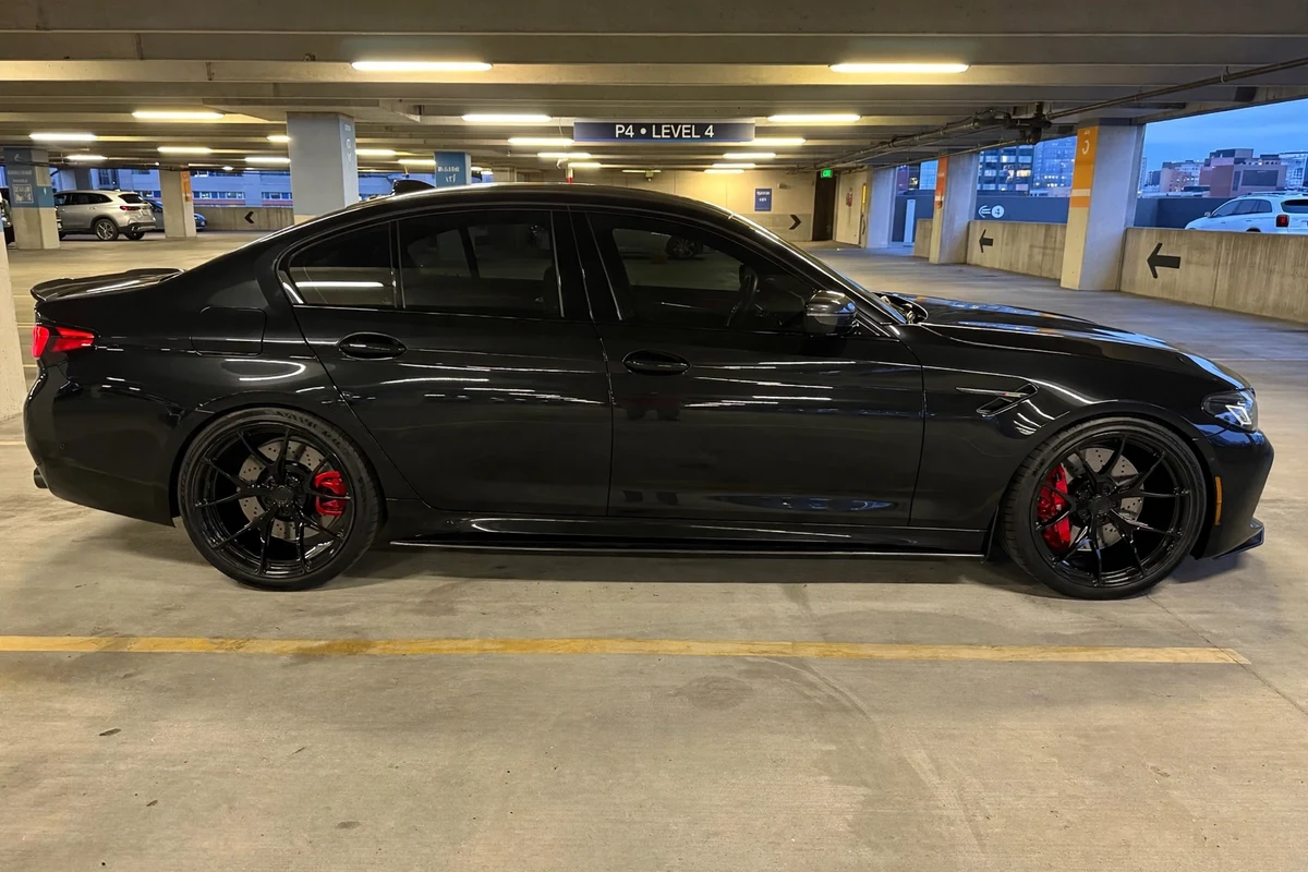 AI-generated view of a 2021 BMW M5 Competition with Signature SV 104 wheels