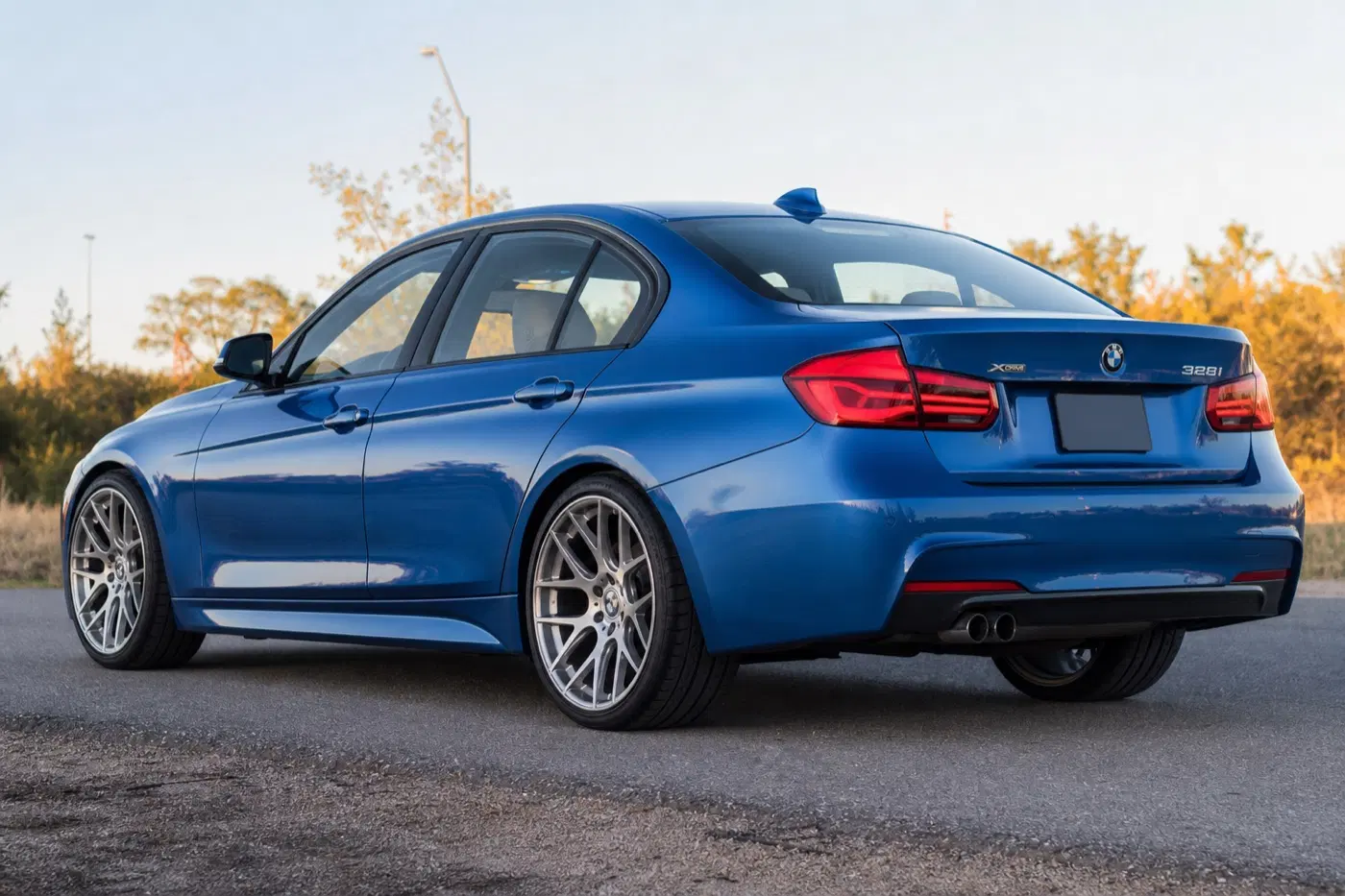 AI-generated view of a 2016 BMW 328i xDrive with Rohana RFX10 wheels