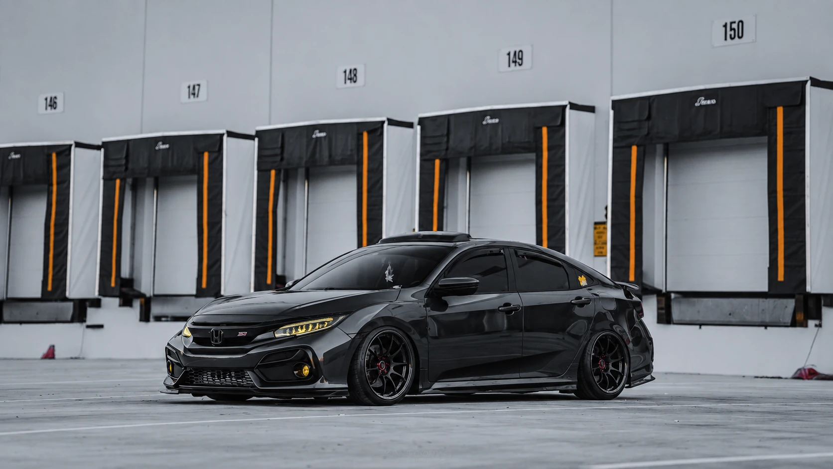 AI-generated view of a 2020 Honda Civic Si with Advan Racing RZII wheels