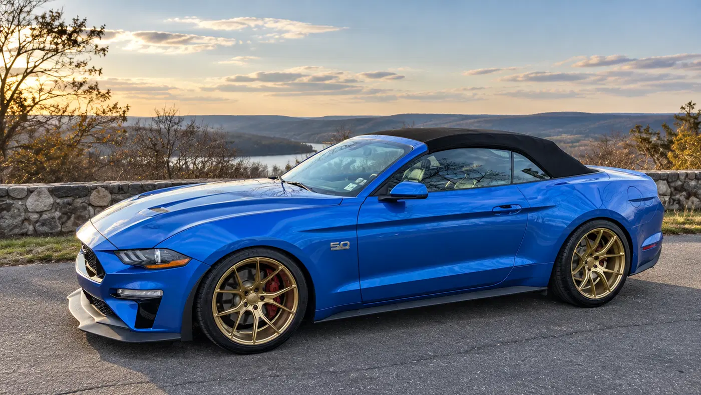 AI-generated view of a 2019 Ford Mustang GT Convertible with Curva C42 wheels