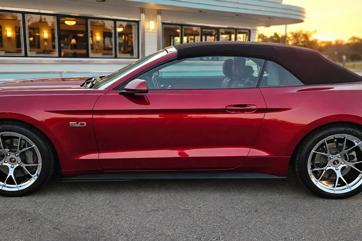 AI-generated view of a 2017 Ford Mustang GT Convertible with Project 6GR 10-Spoke wheels