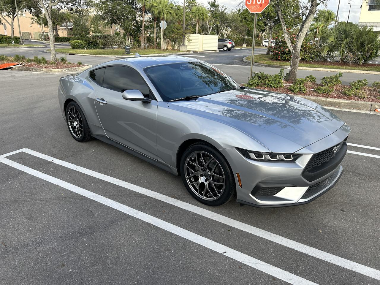 AI-generated view of a 2024 Ford Mustang EcoBoost with American Muscle AMR wheels