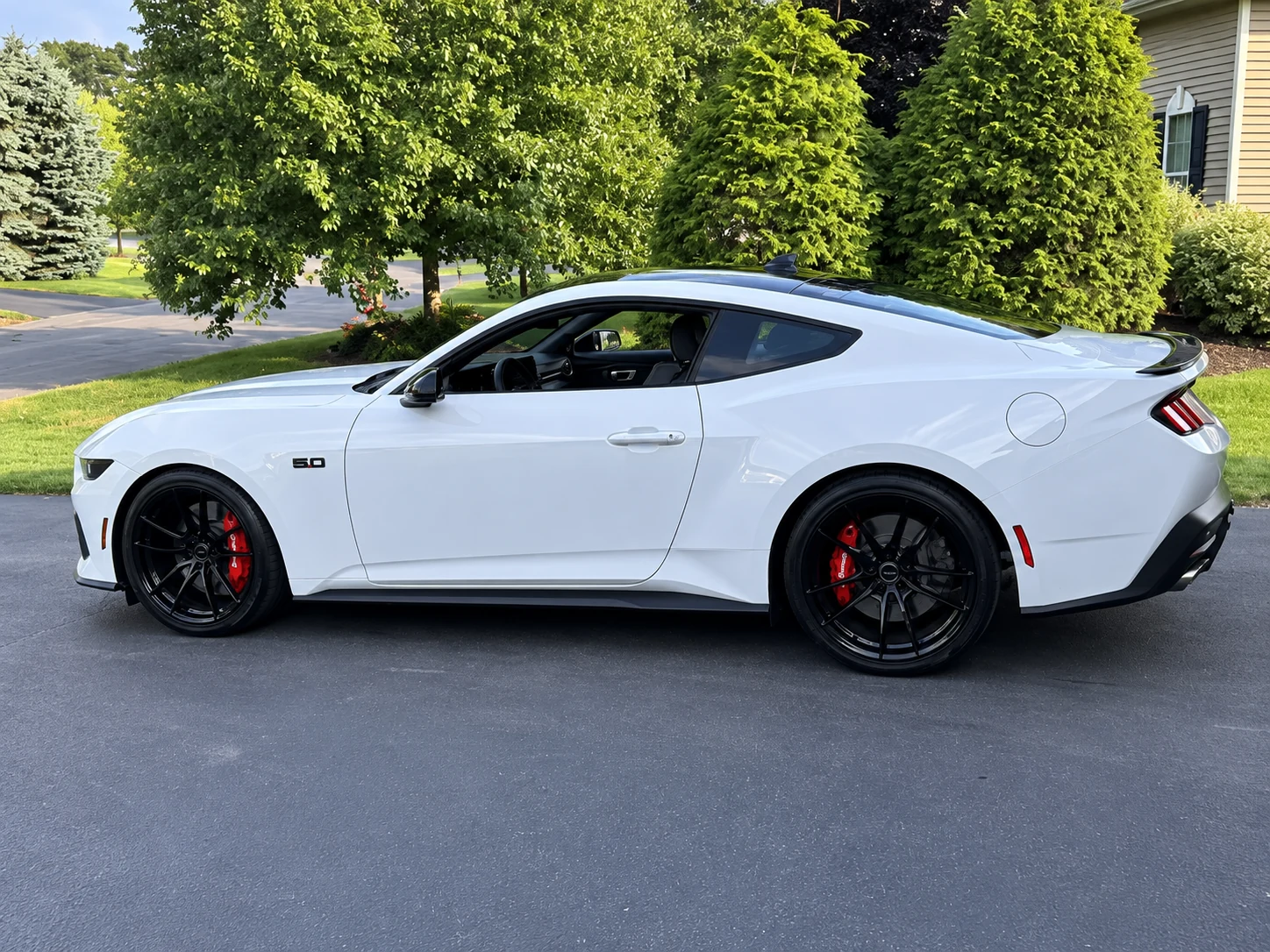 AI-generated view of a 2024 Ford Mustang GT with Velgen VF5 wheels