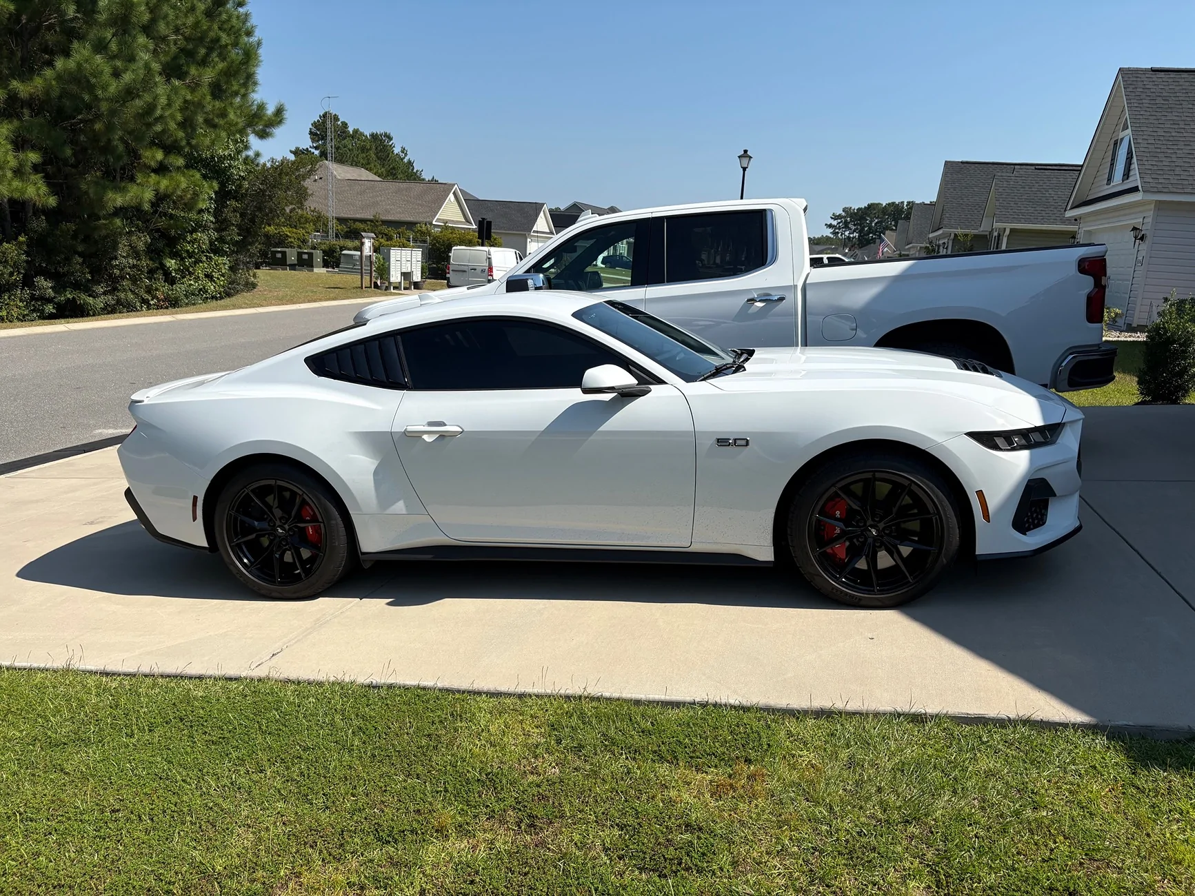 AI-generated view of a 2025 Ford Mustang GT Premium with Ford OEM Dark Horse non-HP wheels