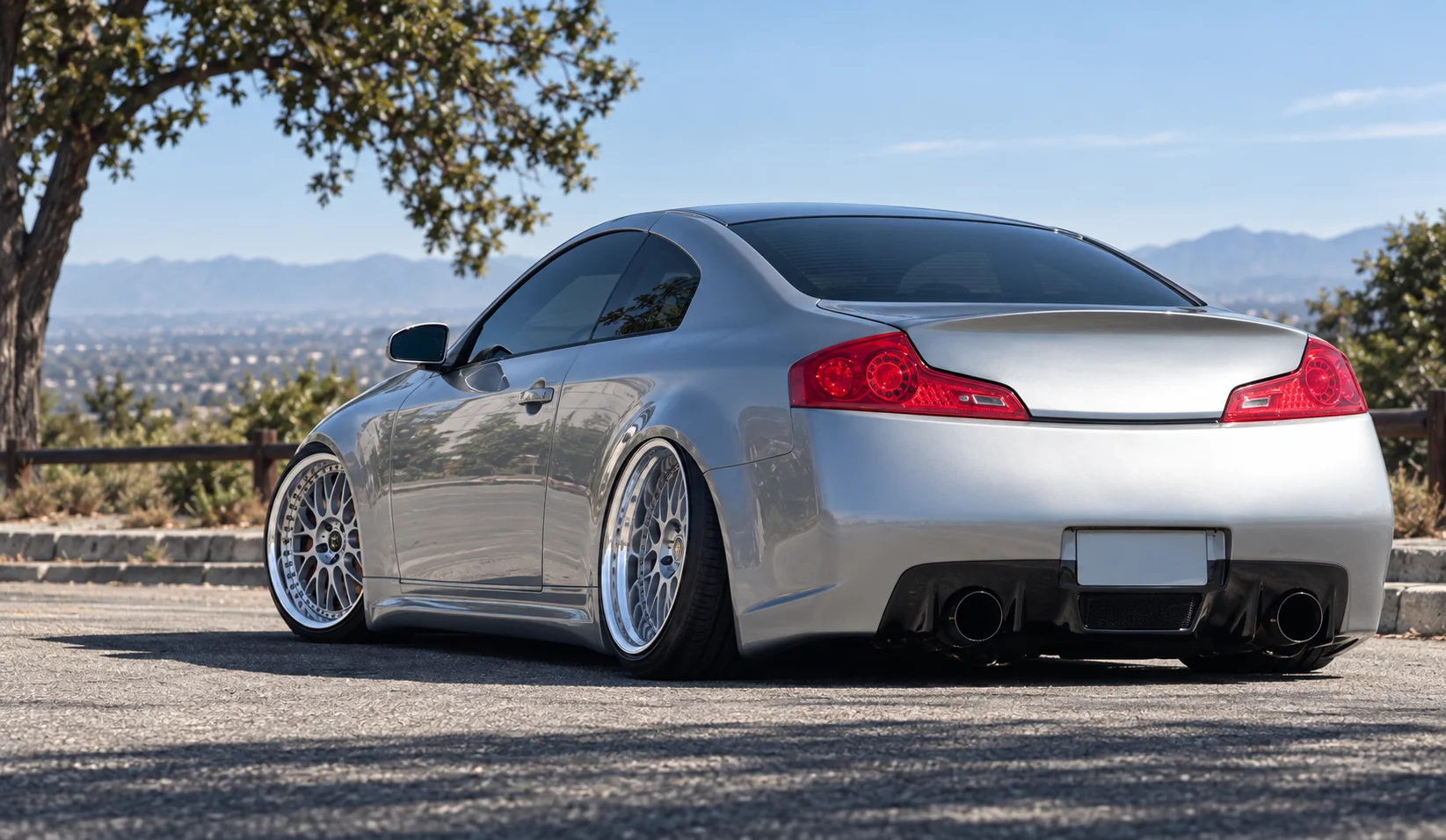AI-generated view of a 2005 Infiniti G35 Coupe with Work VS-XX wheels