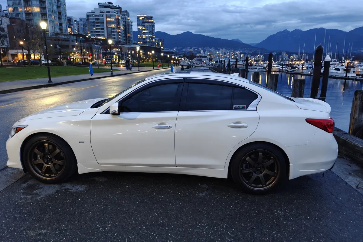AI-generated view of a 2017 Infiniti Q50S Silver Sport with Work Emotion T7R wheels