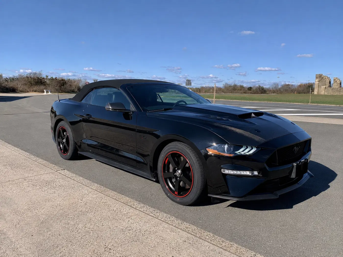 AI-generated view of a 2021 Ford Mustang GT convertible with Motegi MR116 wheels