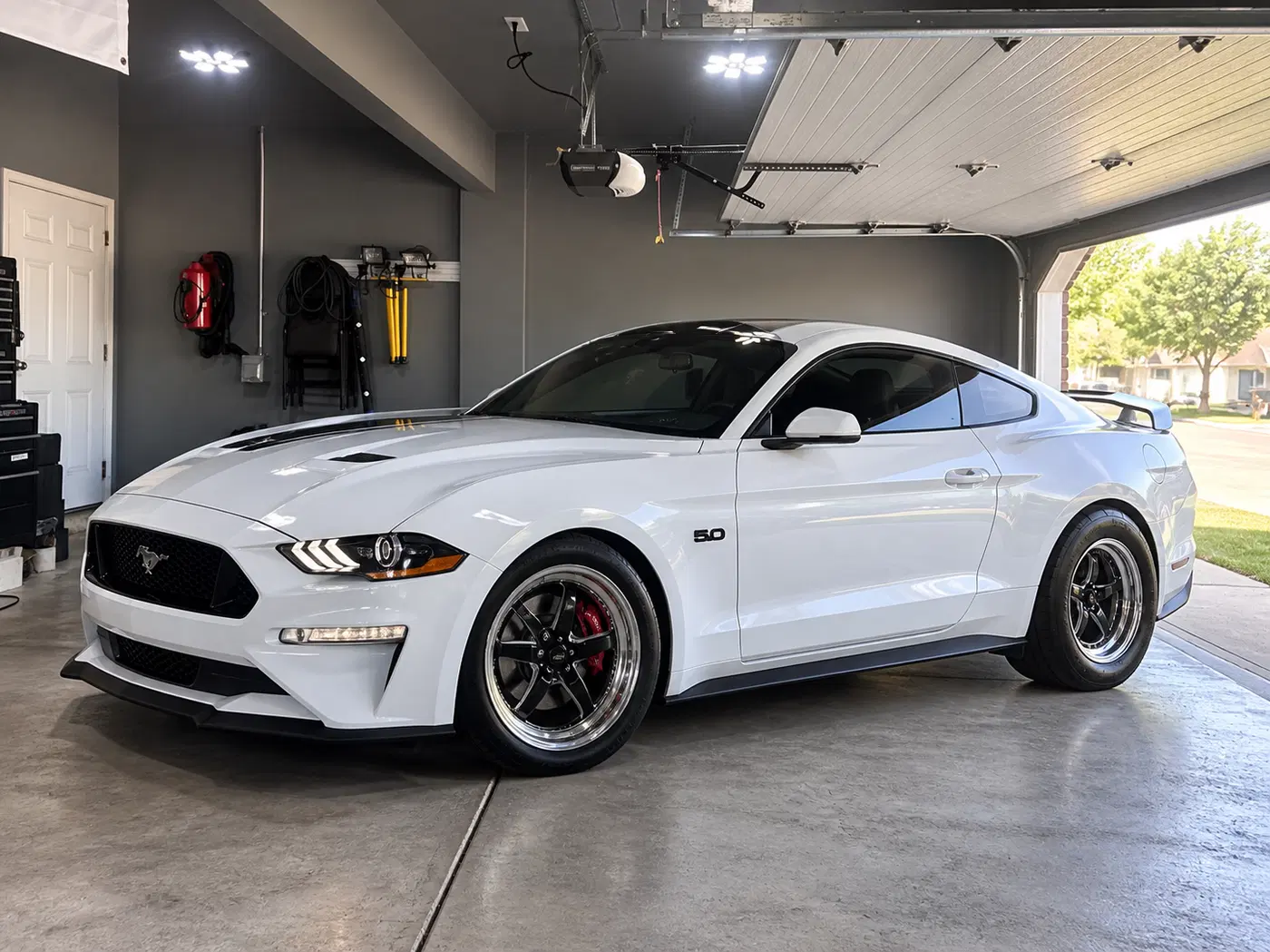 AI-generated view of a 2019 Ford Mustang GT 401A PP1 M6 with Weld Ventura front / Weldstar RT rear wheels