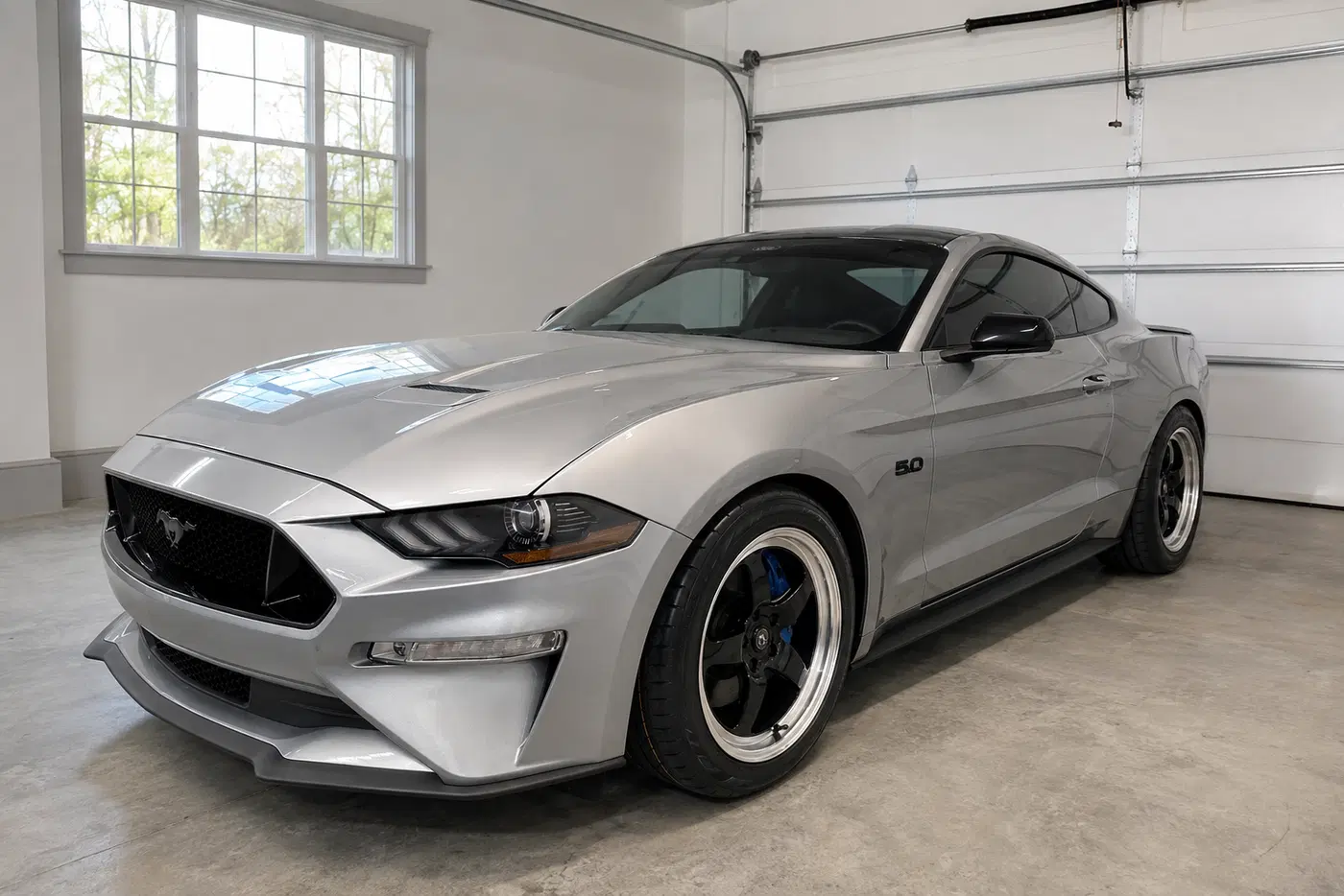 AI-generated view of a 2022 Ford Mustang GT with Forgestar D5 wheels