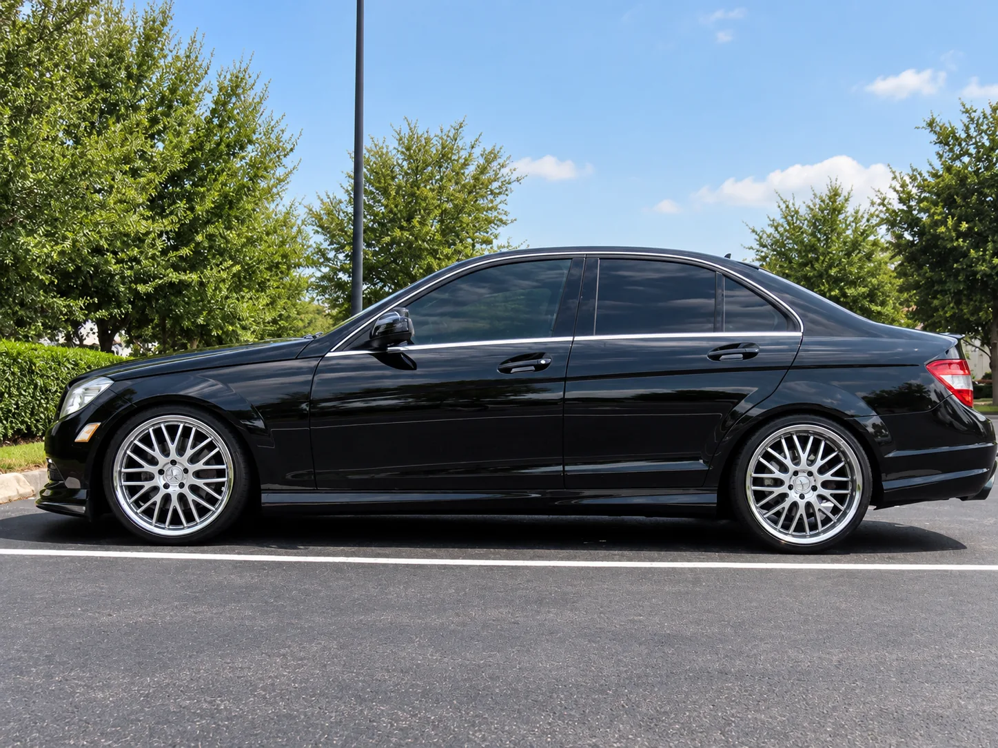 AI-generated view of a 2008 Mercedes-Benz C350 with Petrol Vengeance wheels