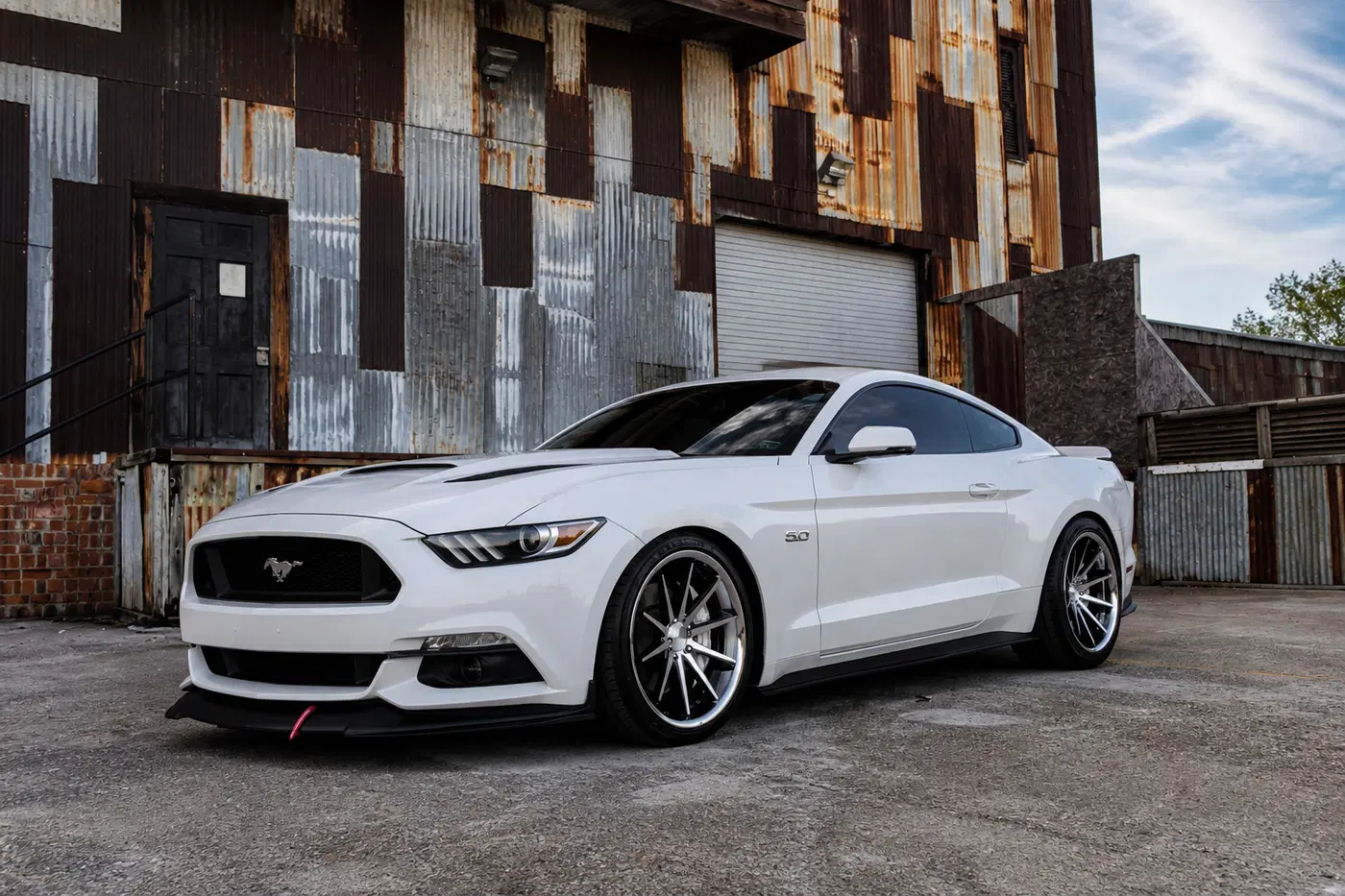 AI-generated view of a 2017 Ford Mustang GT Premium with Ferrada FR4 wheels