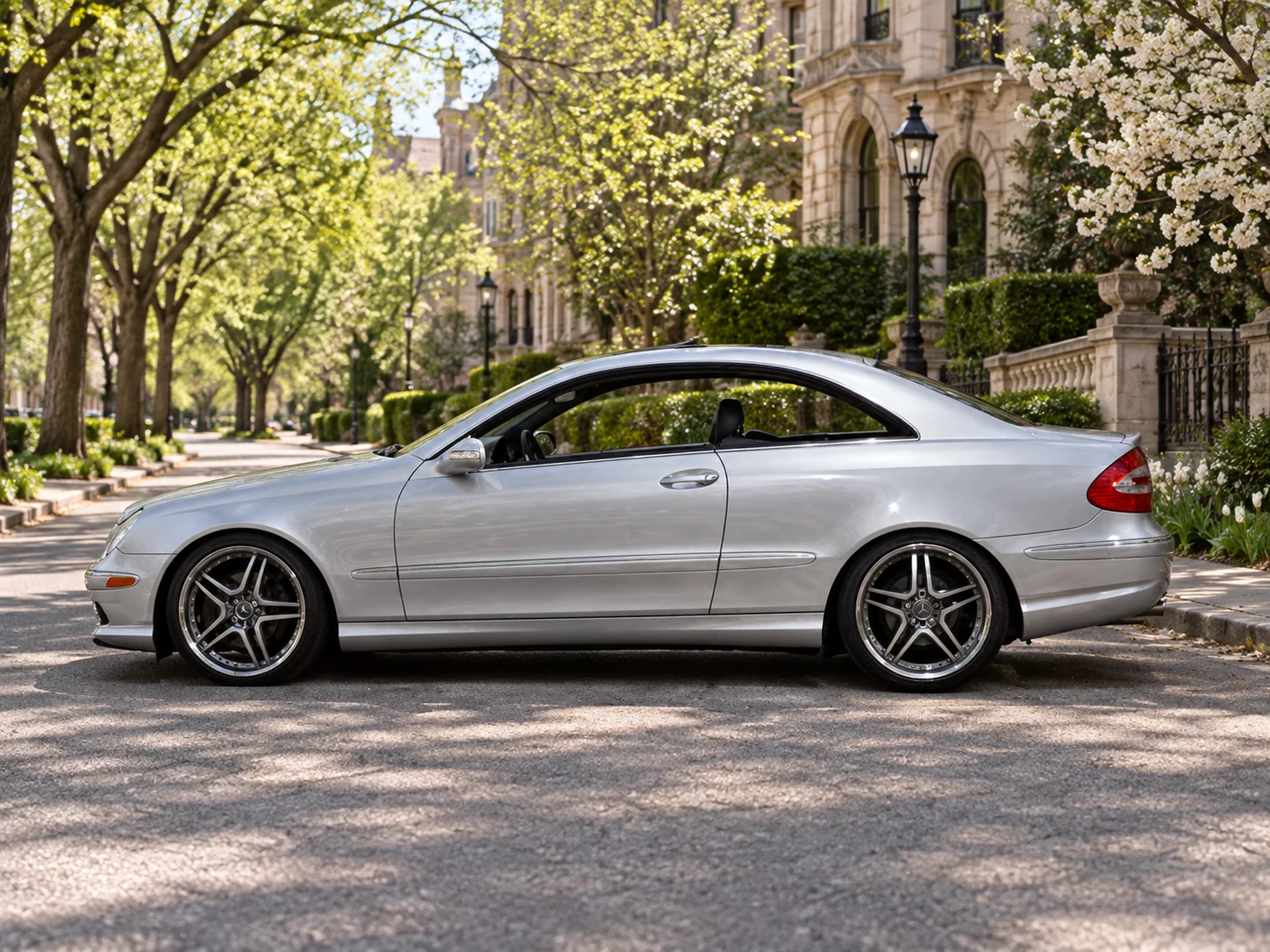 AI-generated view of a 2003 Mercedes-Benz CLK320 Coupe with Monarch Euro 63 RS wheels