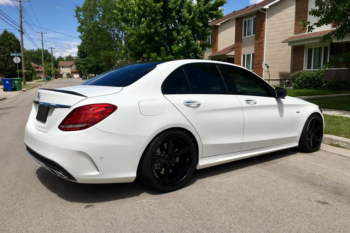 AI-generated view of a 2016 Mercedes-Benz C450 AMG with Stance SC5 wheels