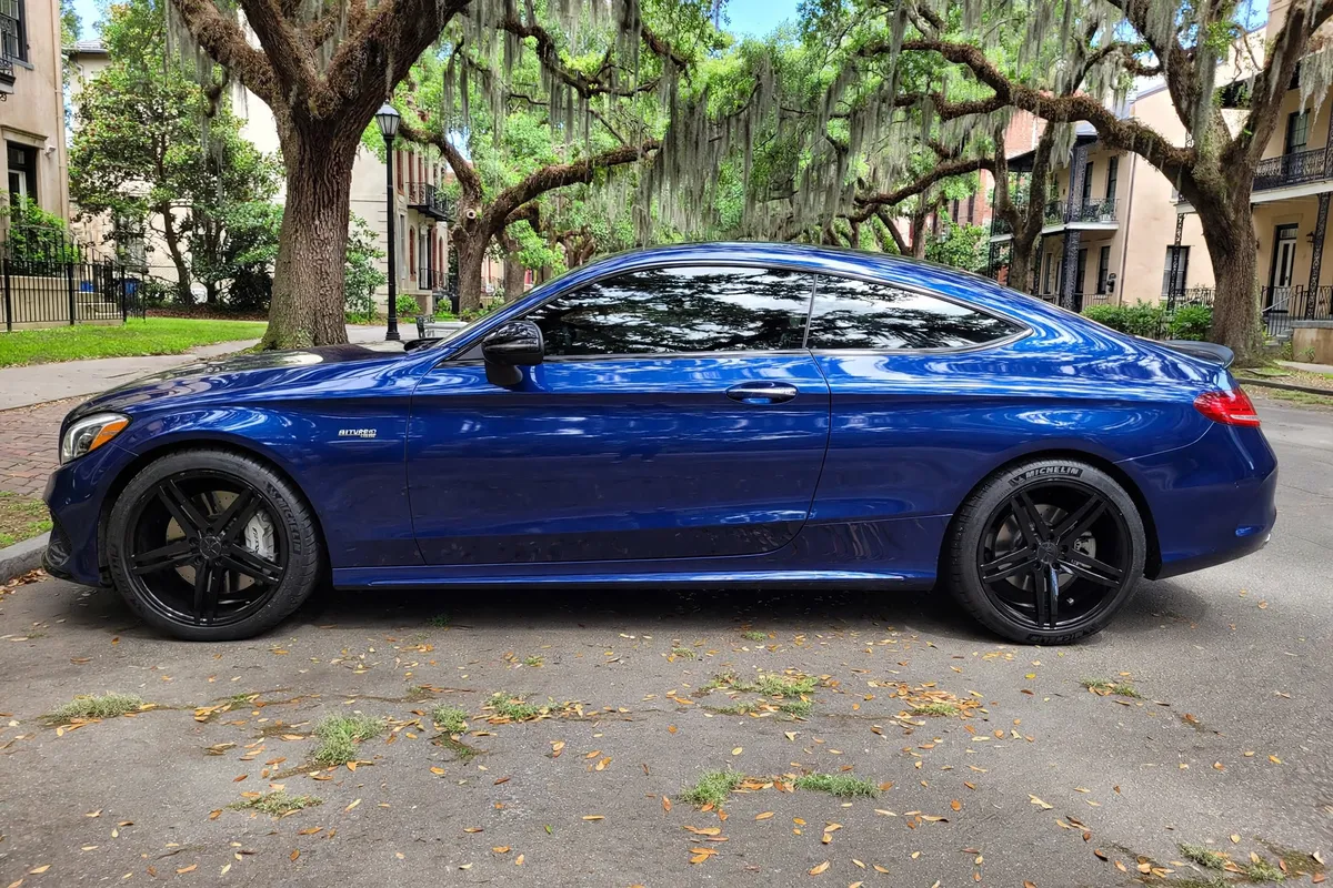 AI-generated view of a 2017 Mercedes-Benz C43 AMG Coupe with Verde V39 Parallax wheels