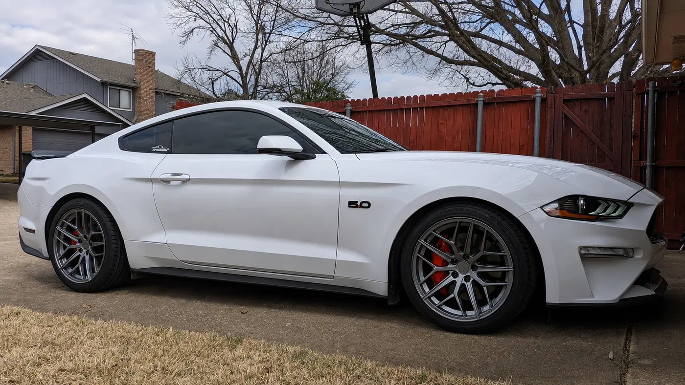 AI-generated view of a 2019 Ford Mustang GT Coupe with Steeda Trident wheels