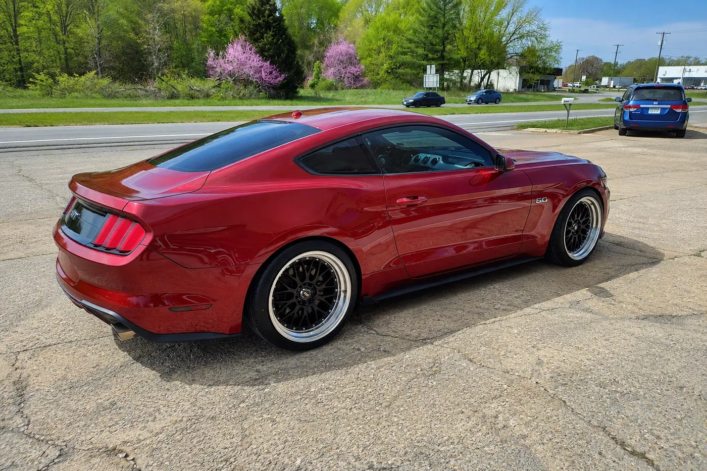 AI-generated view of a 2015 Ford Mustang GT with XXR 521 wheels