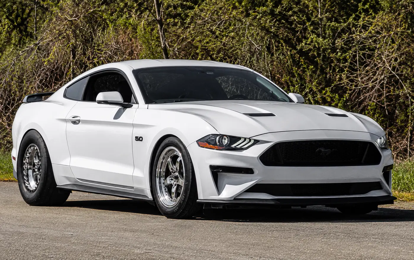 AI-generated view of a 2018 Ford Mustang GT with Weld S71 wheels