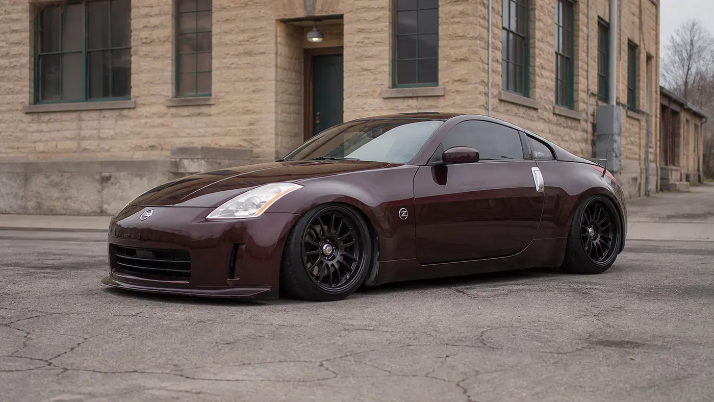 AI-generated view of a 2003 Nissan 350Z with Volk RE30 wheels