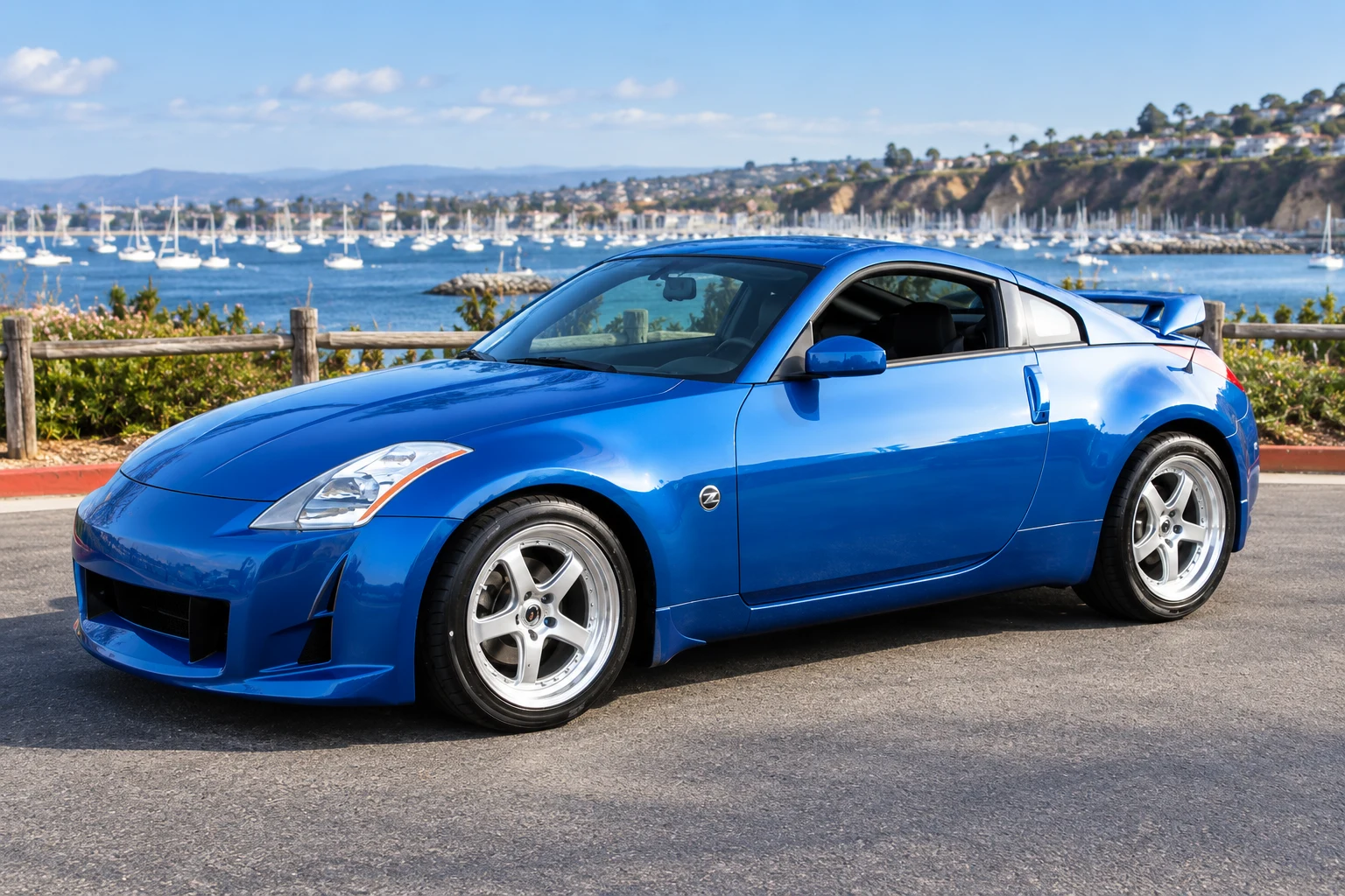 AI-generated view of a 2005 Nissan 350Z with Enkei RP03-RC wheels