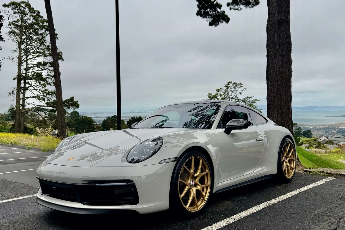 AI-generated view of a 2024 Porsche 911 Carrera T with HRE 521M wheels