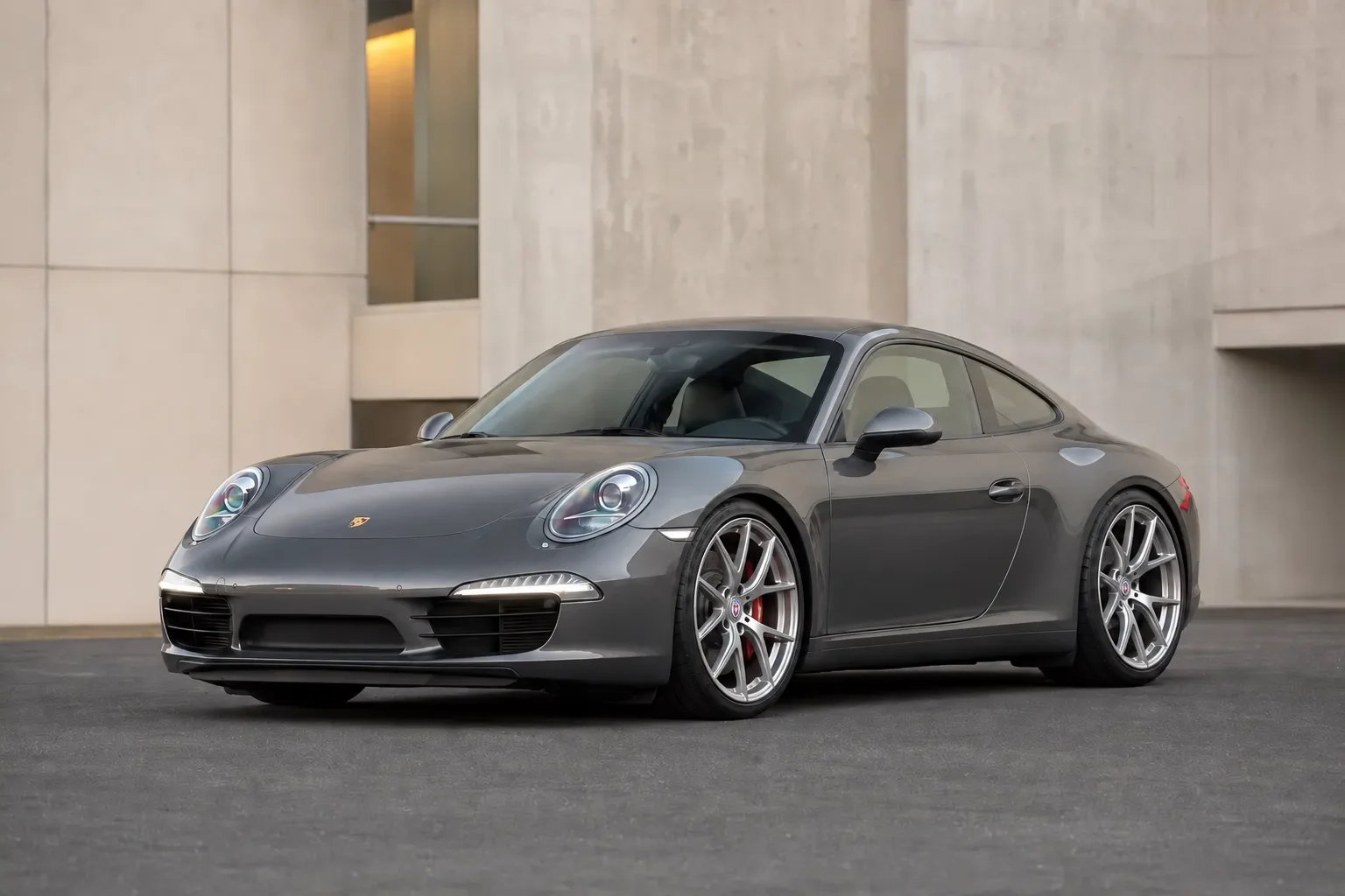 AI-generated view of a 2015 Porsche 911 Carrera S with HRE P101 wheels