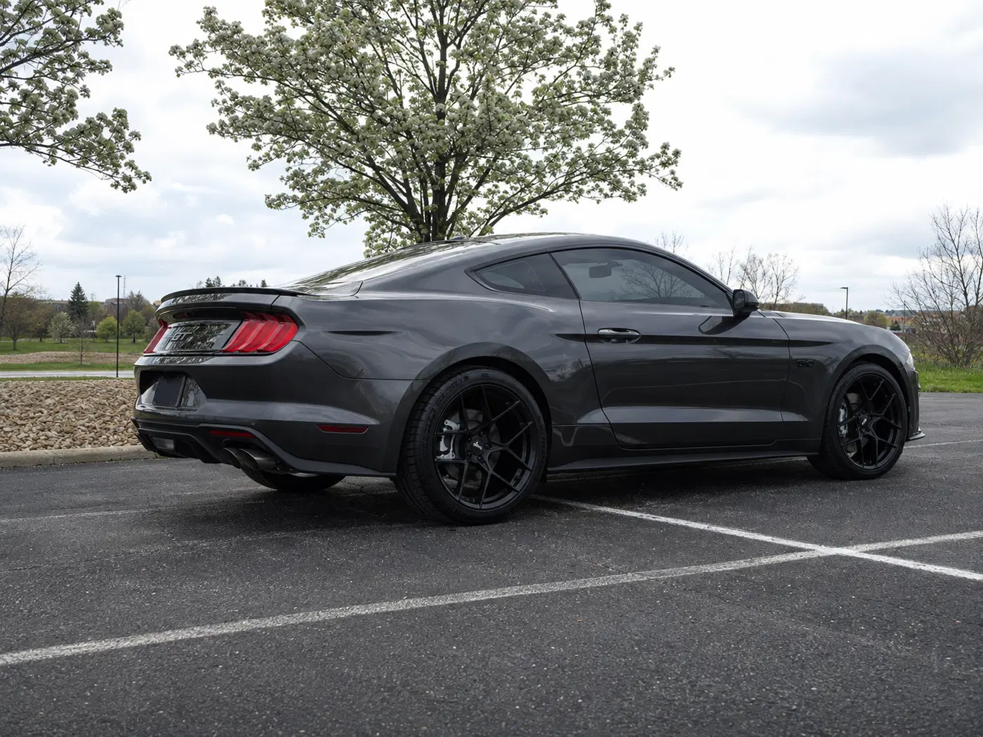 AI-generated view of a 2020 Ford Mustang GT with American Racing AR924 Crossfires wheels