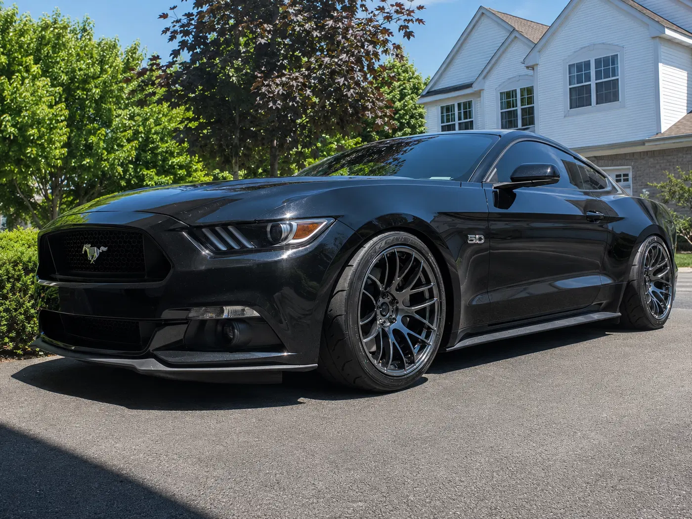 AI-generated view of a 2016 Ford Mustang GT with Work M8R wheels