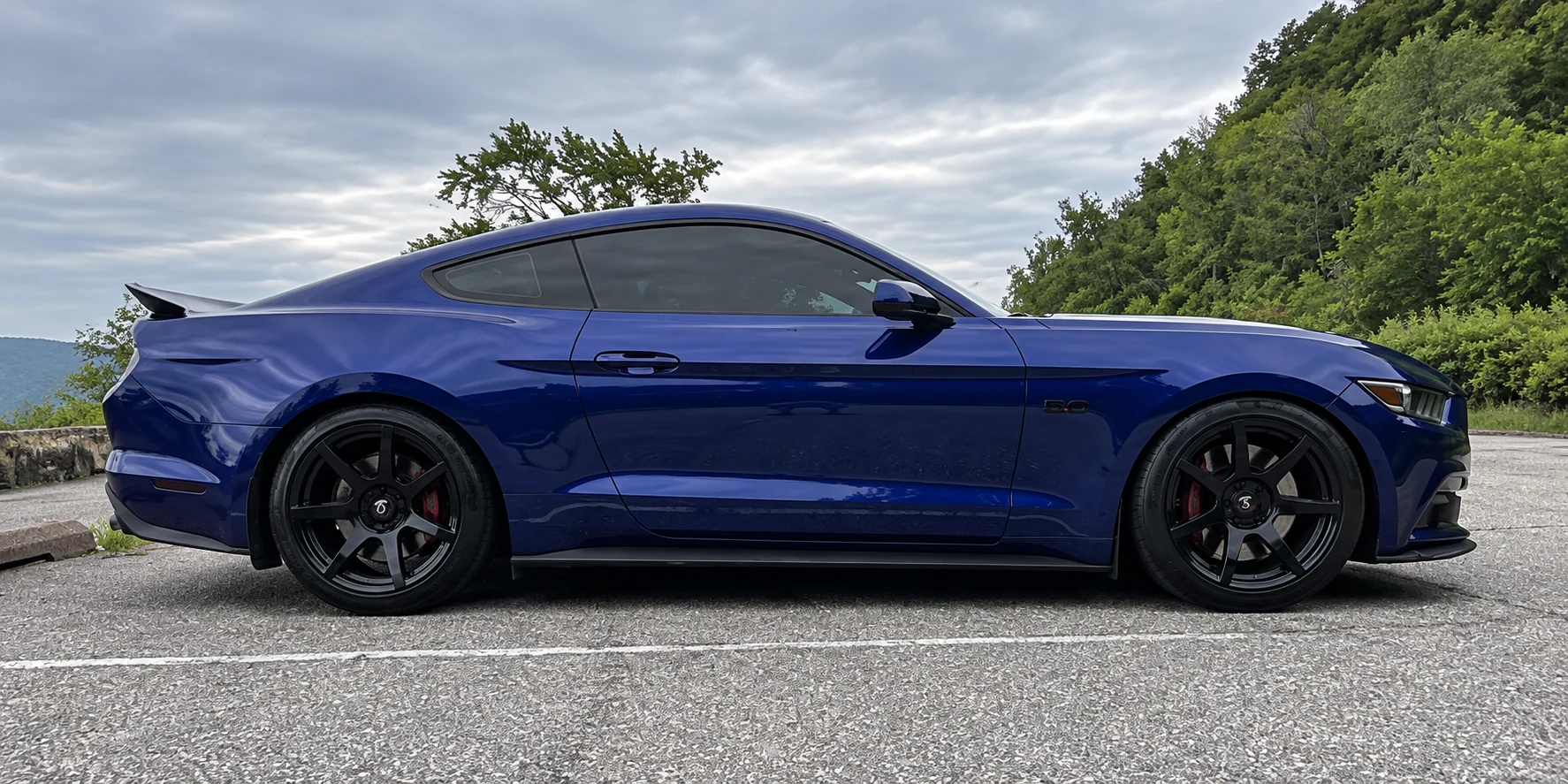 AI-generated view of a 2015 Ford Mustang GT with Project 6GR Seven wheels